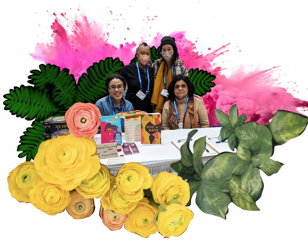 Team Unicorn members Tria Wen and Tijanna Eaton standing behind two people seated at a table displaying gorgeous books by Unicorn alums. In the foreground, colorful flowers; a cluster of ferns and a pink burst of powder in the background.